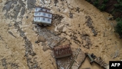 An aerial view shows the area affected by monsoon flooding in Roshi village of Nepal&#39;s Kavre district.&nbsp;Search and rescue teams in the country&#39;s capital picked through wrecked homes after waters receded from monsoon floods that killed at least 209 people around the Himalayan republic.