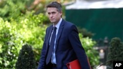 FILE - Britain's Education Secretary Gavin Williamson arrives at Downing Street in London on May 1, 2020. 