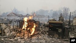 Les restes calcinés d'un immeuble à Middletown, en Californie, le 13 septembre 2015 (AP Photo/Eric Risberg)