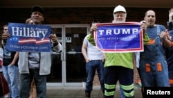 Supporters of U.S. Democratic presidential candidate Hillary Clinton and Republican presidential Donald Trump