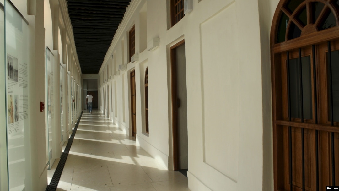A man walks inside the Bin Jelmood house, a museum funded by the Qatari government, in Doha, Qatar, Nov. 10, 2015. 