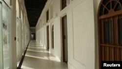 A man walks inside the Bin Jelmood house, a museum funded by the Qatari government, in Doha, Qatar, Nov. 10, 2015. 