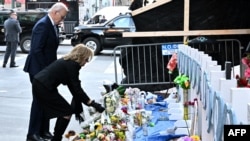 U.S. President Joe Biden and First Lady Jill Biden lay flowers as they pay their respects to victims of the Jan. 1 truck attack at a makeshift memorial in Bourbon Street in New Orleans, Louisiana, on Jan. 6, 2025.