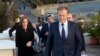 European Council President Donald Tusk, second right, prepares to address the media prior to an EU summit outside his hotel in Valletta, Malta, Feb. 2, 2017. 