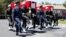 Turkish soldiers carry the coffins of fallen Turkish pilots, Captain Gokhan Ertan and Lieutenant Hasan Huseyin Aksoy, during an official farewell ceremony at the 7th Jet Main Air Base in the eastern Turkish city of Malatya July 6, 2012.