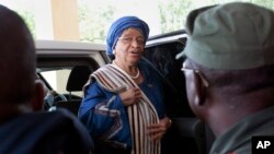 FILE - Liberia's President Ellen Johnson Sirleaf arrives at the Capitol to address lawmakers in Monrovia, Liberia.