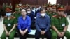 Vietnamese real estate tycoon Truong My Lan, 2nd left, attends trial in an appeal she filed against her death sentence in a financial fraud case in Ho Chi Minh City, Vietnam, Dec. 3, 2024. 