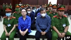 Vietnamese real estate tycoon Truong My Lan, 2nd left, attends trial in an appeal she filed against her death sentence in a financial fraud case in Ho Chi Minh City, Vietnam, Dec. 3, 2024. 