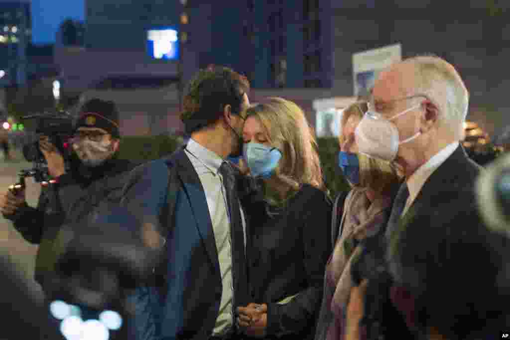 Elizabeth Holmes is consoled by her partner, Billy Evans, after leaving federal court after the verdict in San Jose, California, Jan. 3, 2022.&nbsp;Holmes was convicted of fraud for turning her blood-testing startup Theranos into a sophisticated sham that duped billionaires and other unwitting investors into backing a seemingly revolutionary company whose medical technology never worked as promised.&nbsp;