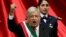 Mexico's new president, Andres Manuel Lopez Obrador, gestures during his inauguration at Congress, in Mexico City, Dec. 1, 2018. 
