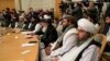 Anggota delegasi Taliban menghadiri konferensi internasional tentang Afghanistan di Moskow pada 20 Oktober 2021. (Foto: Alexander Zemlanichenko/AFP)