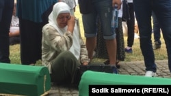 Srebrenica - Bosnia and Herzegovina - Mevlida Aljić is saying goodbye to her brother Jusuf Aljić, who will be buried in the Potočari Memorial Center