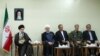 FILE - Iranian Supreme Leader Ayatollah Ali Khamenei, far left, meets with President Hassan Rouhani, second from left, and other members of the president’s Cabinet on Aug. 29, 2018.