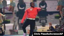 In this June 23, 2019 file photo, DaBaby performs "Sugar" at the BET Awards at the Microsoft Theater in Los Angeles.