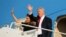 President Donald Trump and first lady Melania Trump wave outside Air Force One before returning to Washington D.C. at Sigonella Air Force Base in Sigonella, Sicily, Italy, May 27, 2017.