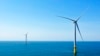 FILE - Two of the offshore wind turbines have been constructed off the coast of Virginia Beach, Va., June 29, 2020. 