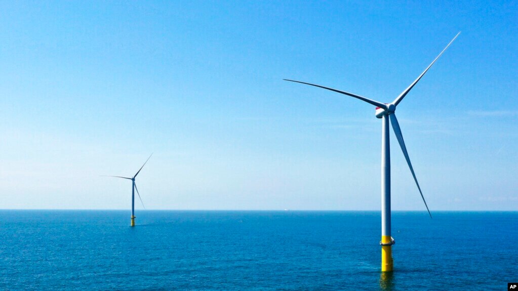 FILE - Part of the offshore wind farm that has been built off the coast of Virginia Beach, Virginia on June 29, 2020. (AP Photo/Steve Helber, File)