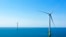 FILE - Two of the offshore wind turbines have been constructed off the coast of Virginia Beach, Va., June 29, 2020. 