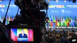 FILE - Russian President Vladimir Putin is seen on a tv camera while he delivers his statement to the media at the Russia-Africa summit in of Sochi, Oct. 24, 2019. (Alexei Druzhinin, Sputnik, Kremlin Pool Photo via AP)