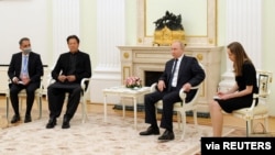 FILE - Russian President Vladimir Putin attends a meeting with Pakistan's Prime Minister Imran Khan in Moscow, Russia, Feb. 24, 2022. (Sputnik/Mikhail Klimentyev/Kremlin via Reuters)