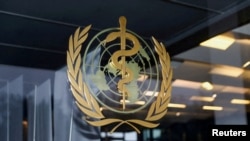 資料照片：世界衛生組織位於日內瓦的大樓入口處的標識。 (2021年12月20日)