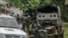 FILE - Peacekeepers rest after the installation of a new base in Rugari, 50 km from the city of Goma in the east of the Democratic Republic of Congo, Jan. 28, 2022.