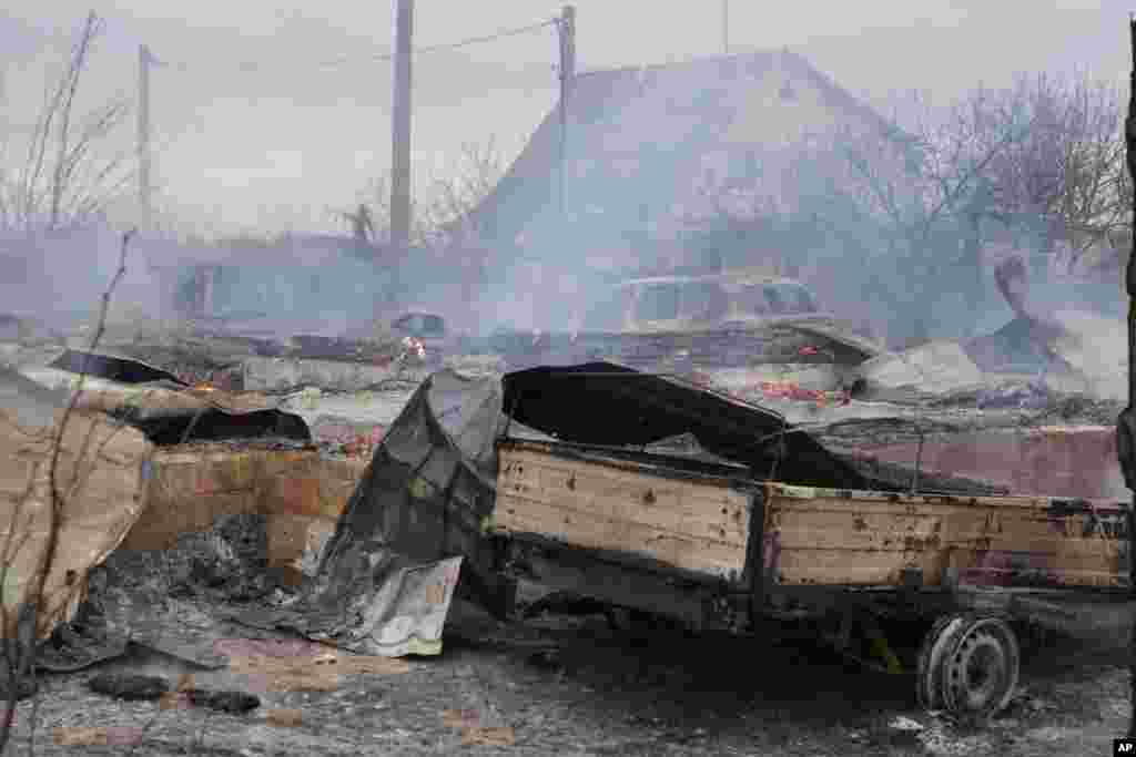 The debris of a private house in the aftermath of Russian shelling outside Kyiv, Ukraine, Feb. 24, 2022.