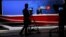 FILE - A news anchor is seen on camera during a broadcast at Tolo News studio, in Kabul, Afghanistan, Oct. 18, 2015.