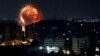 An explosion is seen as Israel strikes Gaza