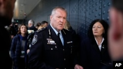 Peter Crozier of the Australian police speaks to media after the court's verdict in the downing of Malaysia Airlines flight 17 trial at Schiphol airport, near Amsterdam, Netherlands, Thursday, Nov. 17, 2022. (AP Photo/Phil Nijhuis)