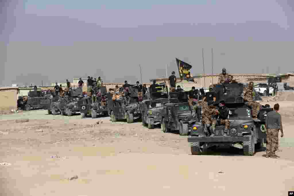 Iraq's elite counterterrorism forces gather ahead of an operation to re-take the Islamic State-held City of Mosul, outside Erbil, Iraq, Oct. 15, 2016.