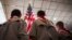FILE - Boy Scouts stand on stage with a U.S. flag during the Pledge of Allegiance to begin the inaugural Freedom Summit meeting for conservative speakers in Manchester, New Hampshire, April 12, 2014. 