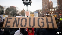 Demonstrators participate in a President's Day protest against US President Donald Trump immigration policy at the Union Square, Feb. 18, 2019, in New York City.