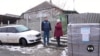 In Ukraine's Kharkiv region, aid workers risk lives to keep residents warm