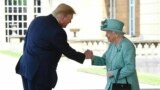 U.S President Donald Trump, accompanied by his wife Melania and Britain&#39;s Prince Andrew, second left, places a wreath on the Grave of the Unknown Warrior during a tour of Westminster Abbey in central London, June 3, 2019.