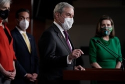 FILE - House Budget Committee Chairman John Yarmuth, D-Ky., speaks with reporters before the House votes to pass a $1.9 trillion pandemic relief package, during a news conference at the Capitol in Washington, Feb. 26, 2021.