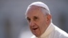 FILE - Pope Francis arrives in St. Peter's square at the Vatican for his weekly general audience, Sept. 9, 2015.