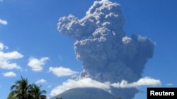 The Chaparrastique volcano spews ash in the municipality of San Miguel, El Salvador, Dec. 29, 2013.