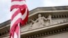 FILE - The front facade of the Robert F. Kennedy Department of Justice Building is seen in Washington, in a June 19, 2015, photo.