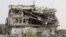 A view of a building destroyed by a Saudi-led air strike is seen in Haradh city of Yemen's northwestern province of Hajja May 20, 2015. 