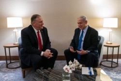 U.S. Secretary of State Mike Pompeo meets with Israeli Prime Minister Benjamin Netanyahu in Lisbon, Portugal, Dec. 4, 2019. (Credit: State Department)