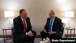 U.S. Secretary of State Michael R. Pompeo meets with Israeli Prime Minister Benjamin Netanyahu in Lisbon, Portugal, Dec. 4, 2019. (Credit: State Department)
