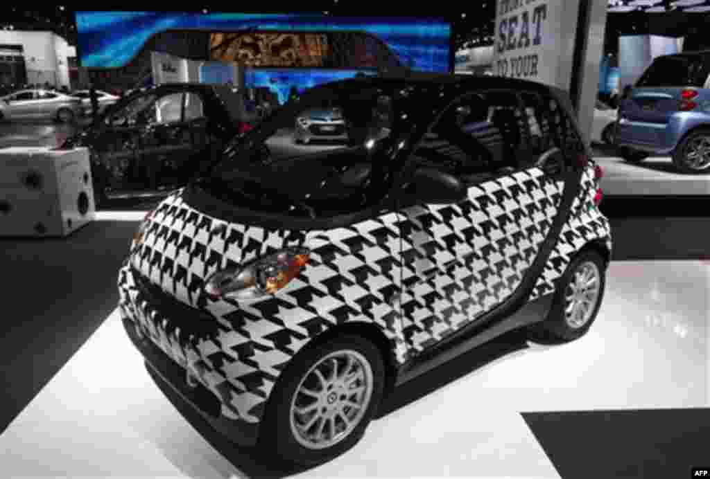 A 2011 Smart Fortwo Cabriolet is shown at the North American International Auto Show in Detroit, Tuesday, Jan. 11, 2011. (AP Photo/Paul Sancya)