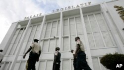 Guards patrol front of Haiti's parliament - Palais Legislatif - in Port-au-Prince. 