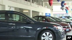 Automobiles in a Honda dealer's showroom, Los Angeles, California