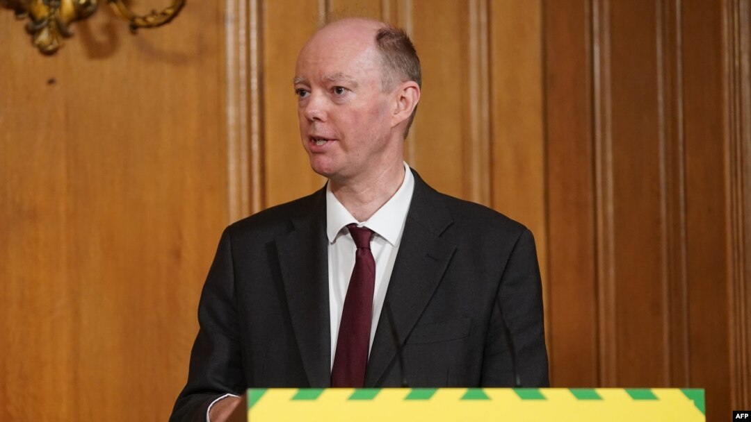 FILE - Britain's Chief Medical Officer for England Chris Whitty attends a remote press conference to update the nation on the COVID-19 pandemic, inside 10 Downing Street in central London on June 10, 2020.