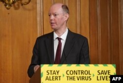 Britain's Chief Medical Officer for England Chris Whitty attends a remote press conference to update the nation on the COVID-19 pandemic, inside 10 Downing Street in central London on June 10, 2020.