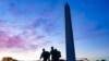 FILE - U.S. National Guard members walk toward the White House from the Washington Monument in Washington, Nov. 3, 2020.