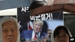 FILE - Protesters stage a rally to oppose the United States' policies against North Korea near U.S. Embassy in Seoul, South Korea, Oct. 7, 2019. 