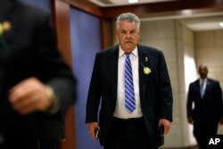 FILE - Rep. Peter King, R-N.Y., arrives for a classified briefing on Capitol Hill in Washington, May 21, 2019.